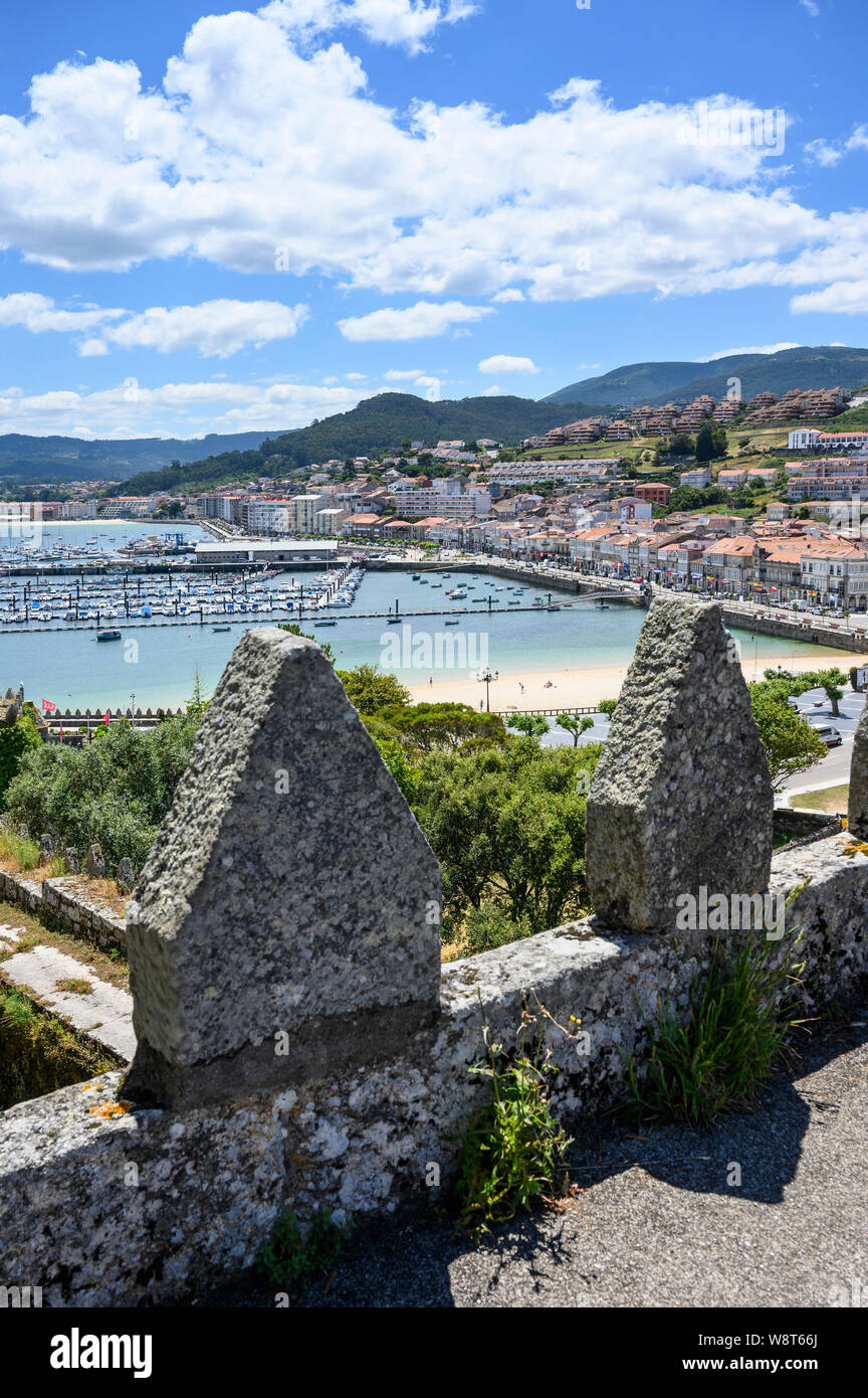 Looking acros the harbour to the old town of Baiona from Monterreal castle, in Pontevedra Province, Southern Galicia, Spain Stock Photo