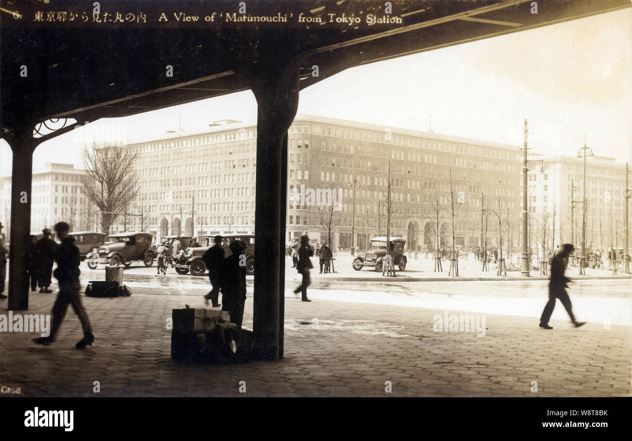 [ 1930s Japan - Marunouchi Building, Tokyo ] —   Marunouchi Building (Maru Biru) in Marunouchi (丸の内) in Tokyo, as seen from Tokyo Station. The building was designed by Kotaro Sakurai and opened in 1923, just before the earthquake devastated the city. It was Japan’s very first office building, and with 371 offices the largest office building in Asia. It was replaced by a 37-story building in 2002. The location is now among the most expensive real estate in Japan.  20th century vintage postcard. Stock Photo
