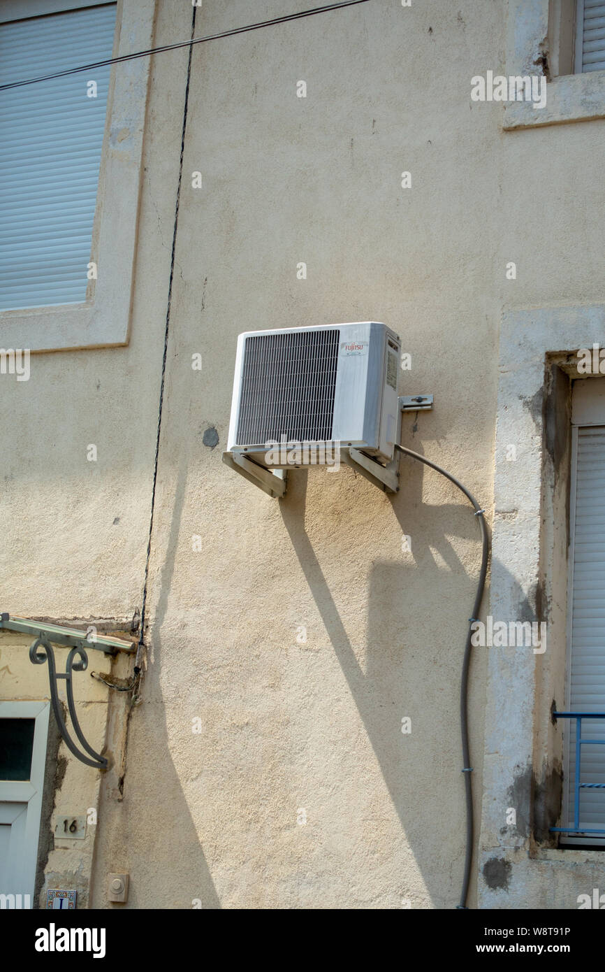 Air conditioning unit on an outside wall Stock Photo Alamy