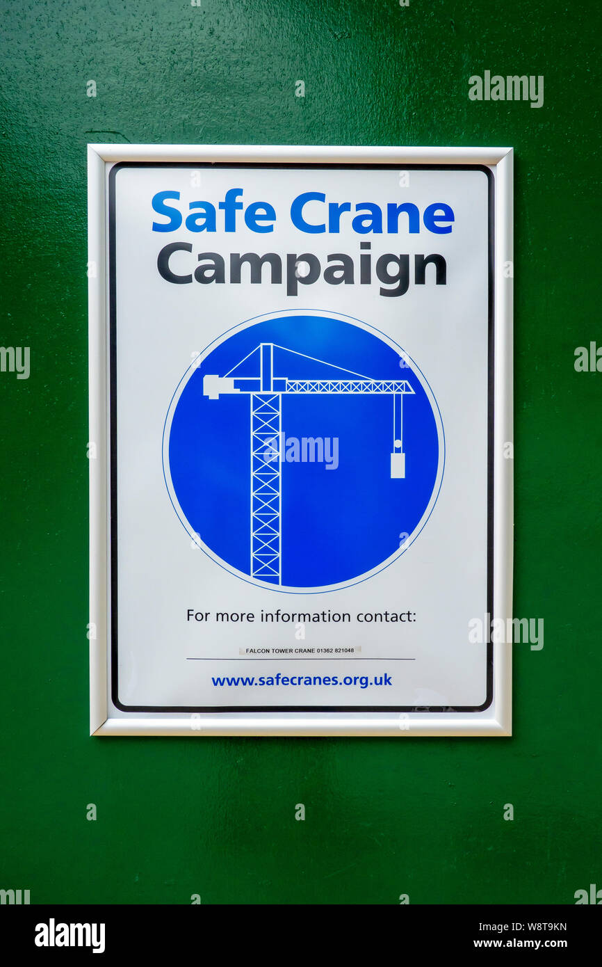 Safe crane campaign poster on green background Stock Photo