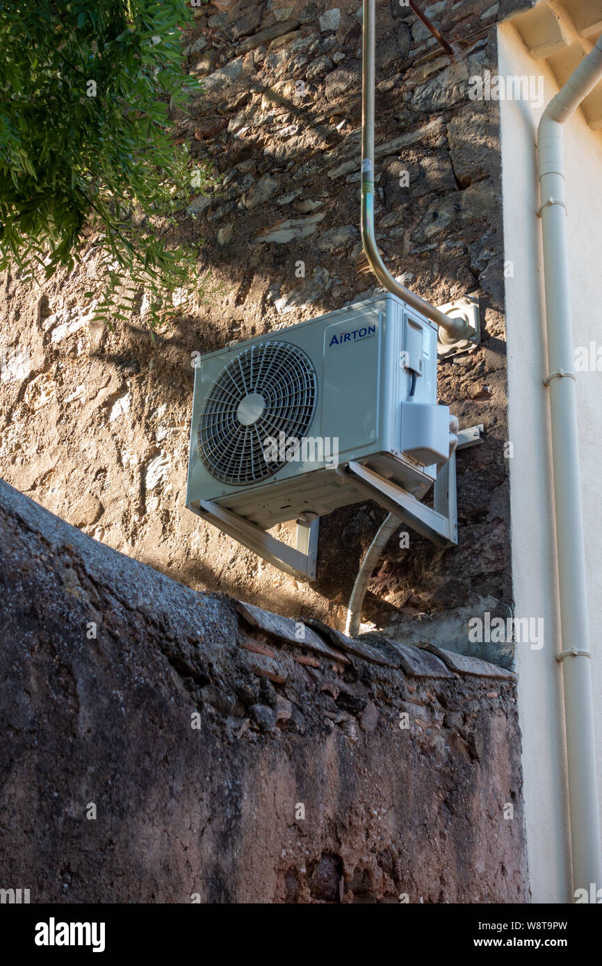 Air Conditioning exterior unit on French house wall Stock Photo Alamy