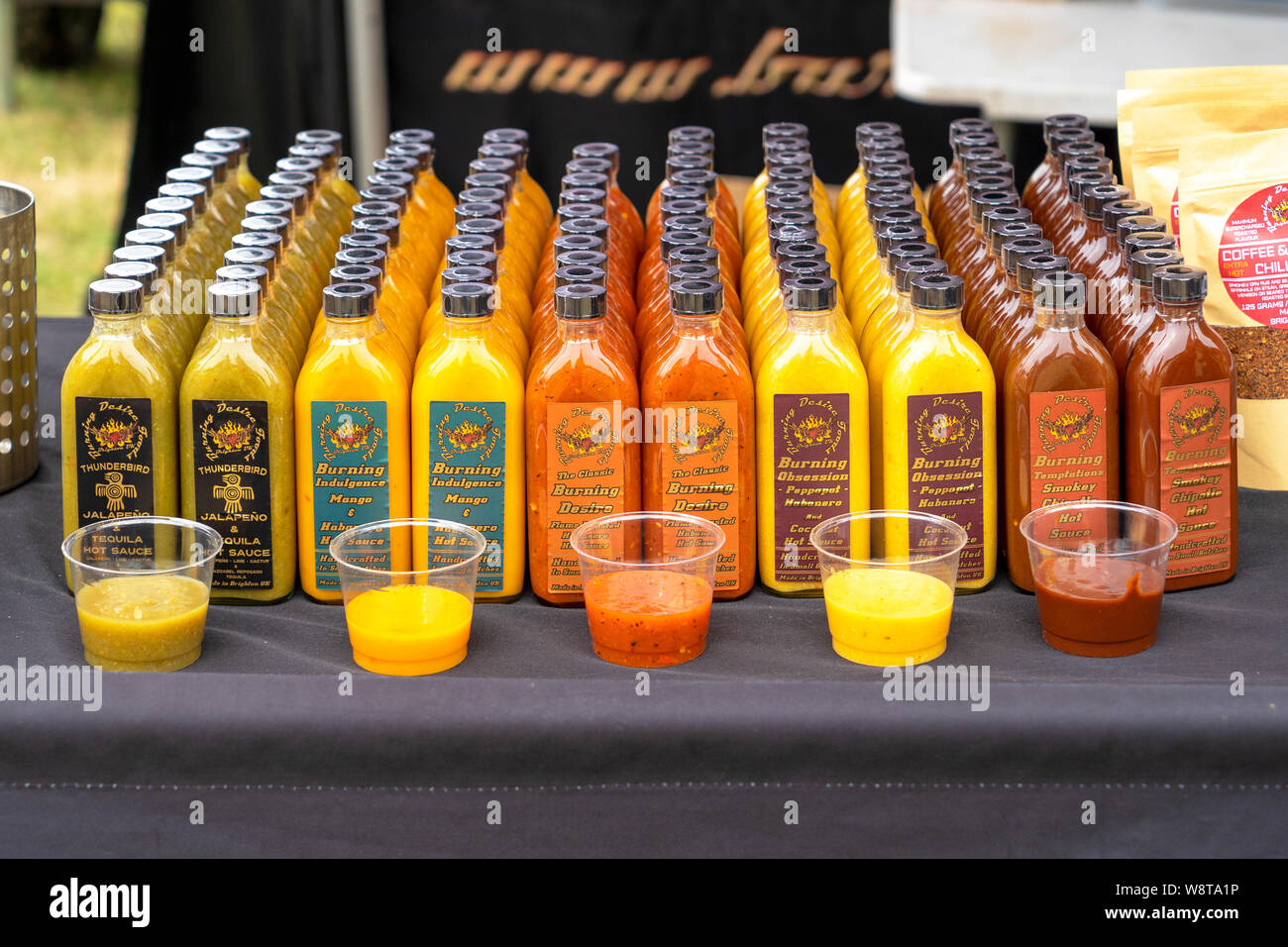 Bottles of Chilli sauce for sale at the Dorset Chilli festival Stock Photo