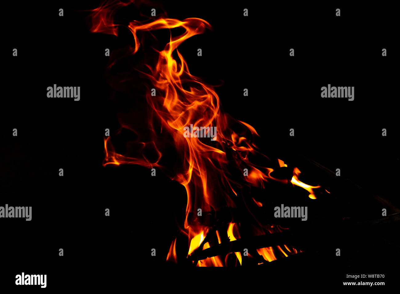 Fire flames on a black background abstract. Stock Photo