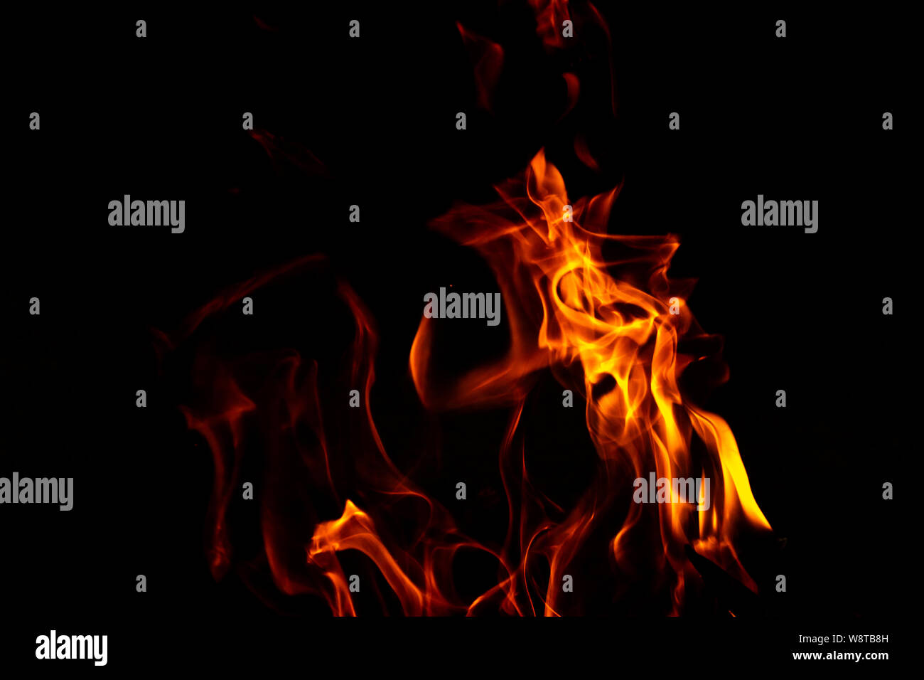 Fire flames on a black background abstract. Stock Photo