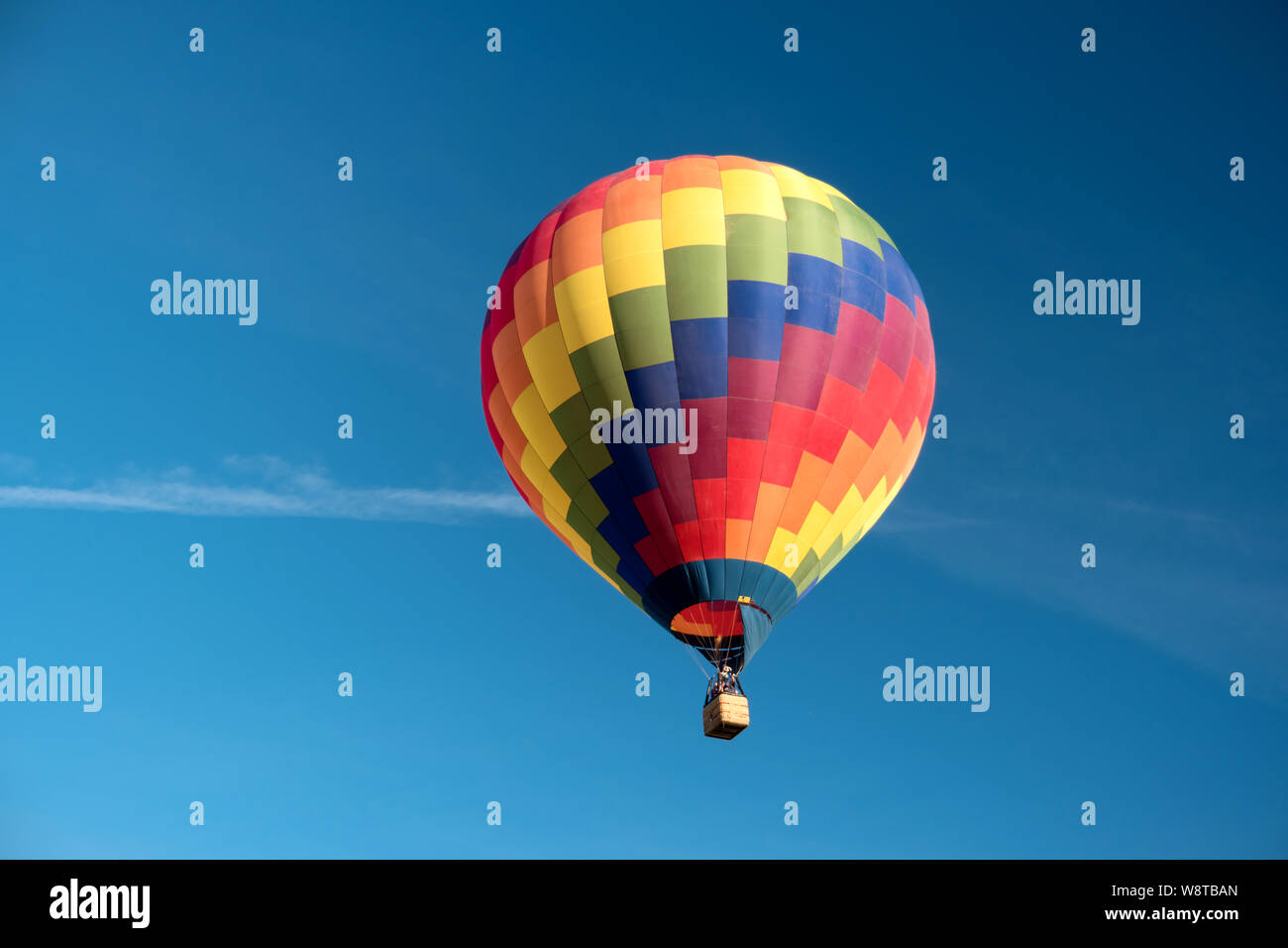 Detail of a starting colorful hot air balloon Stock Photo