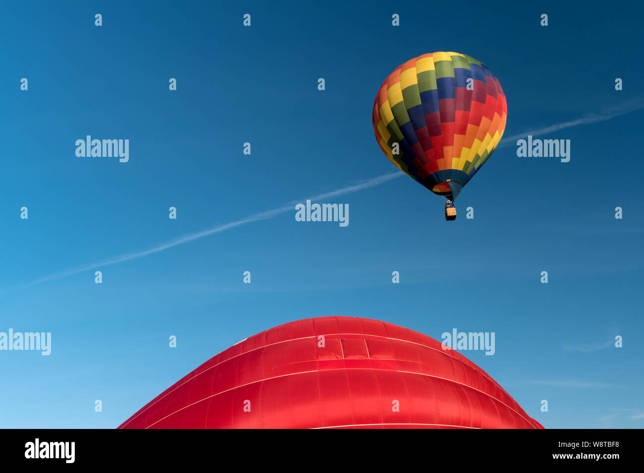 Detail of a starting colorful hot air balloon Stock Photo