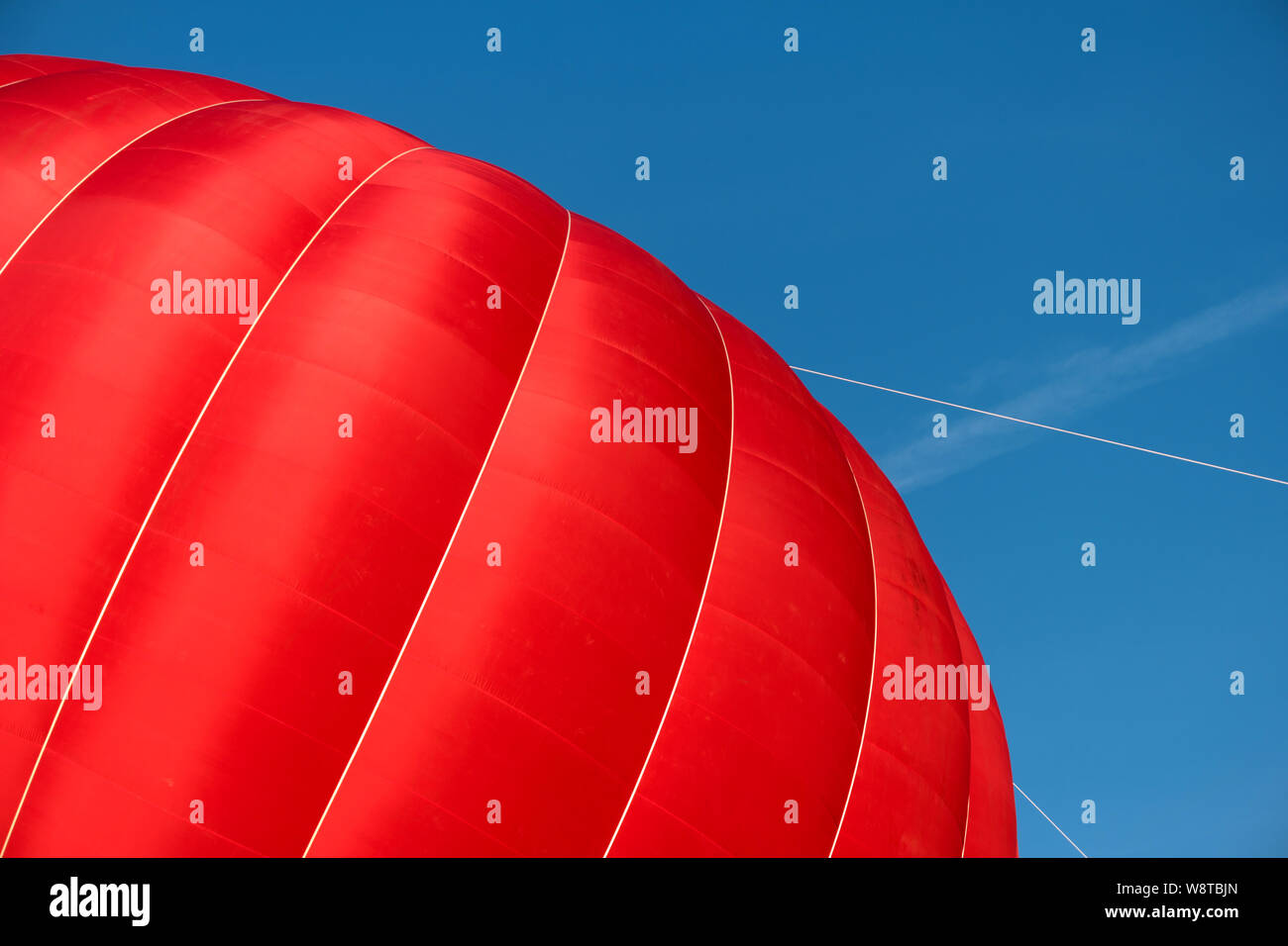 Detail of a starting red hot air balloon Stock Photo