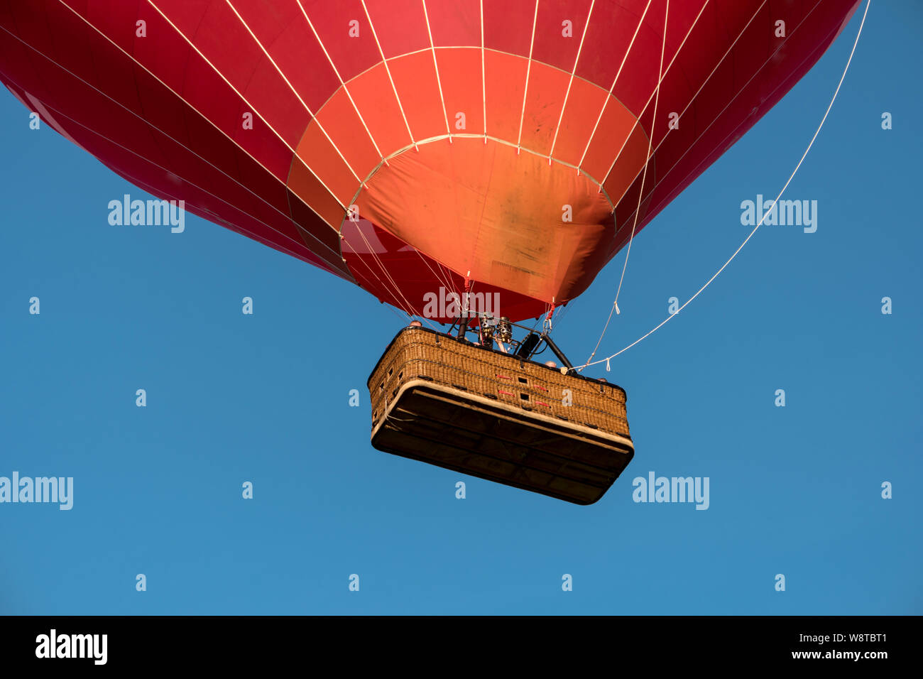 Detail of a starting red hot air balloon Stock Photo