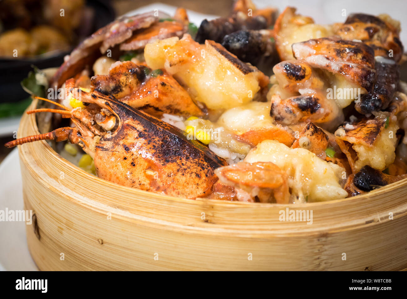Chinese lobster sticky rice (lobster and glutinous rice), the signature dish from Ho Yuen Kee Restaurant in Vancouver, British Columbia, Canada. Stock Photo