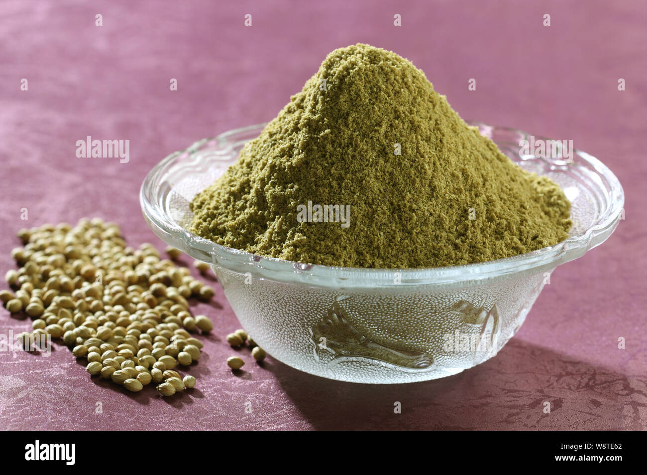 Bowl of coriander powder with seeds Stock Photo Alamy