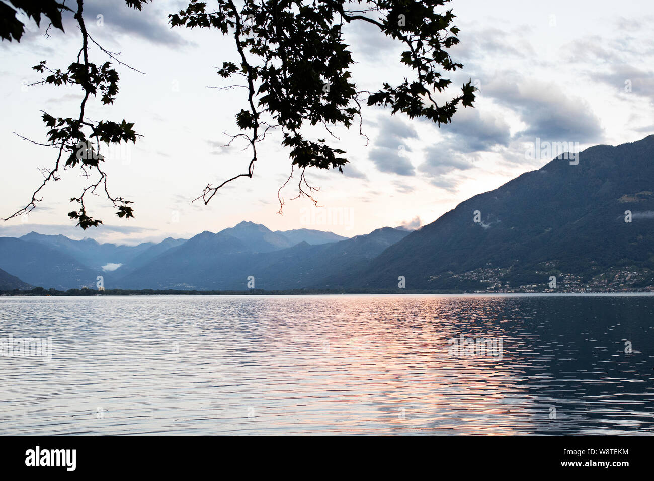 Summer sunset along the Lago Maggiore in the city of Locarno in the Italian region of Ticino in Switzerland. Stock Photo