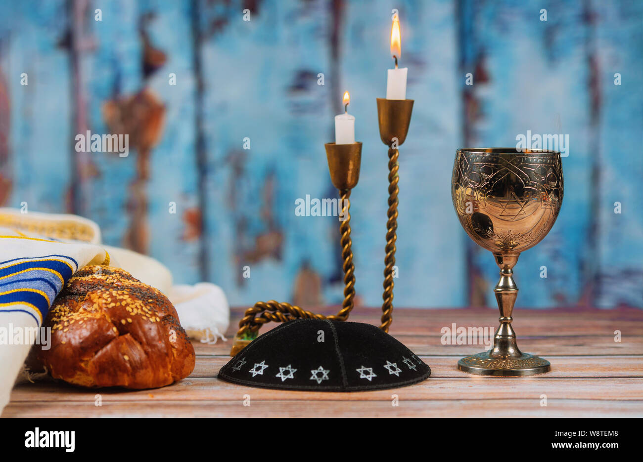 Fresh homemade wine, challah and candles for the Holy Sabbath Prayer