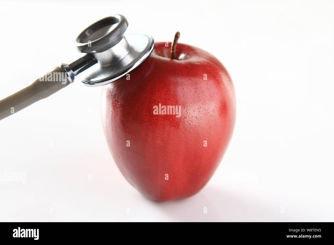 Close up of an apple with stethoscope Stock Photo Alamy