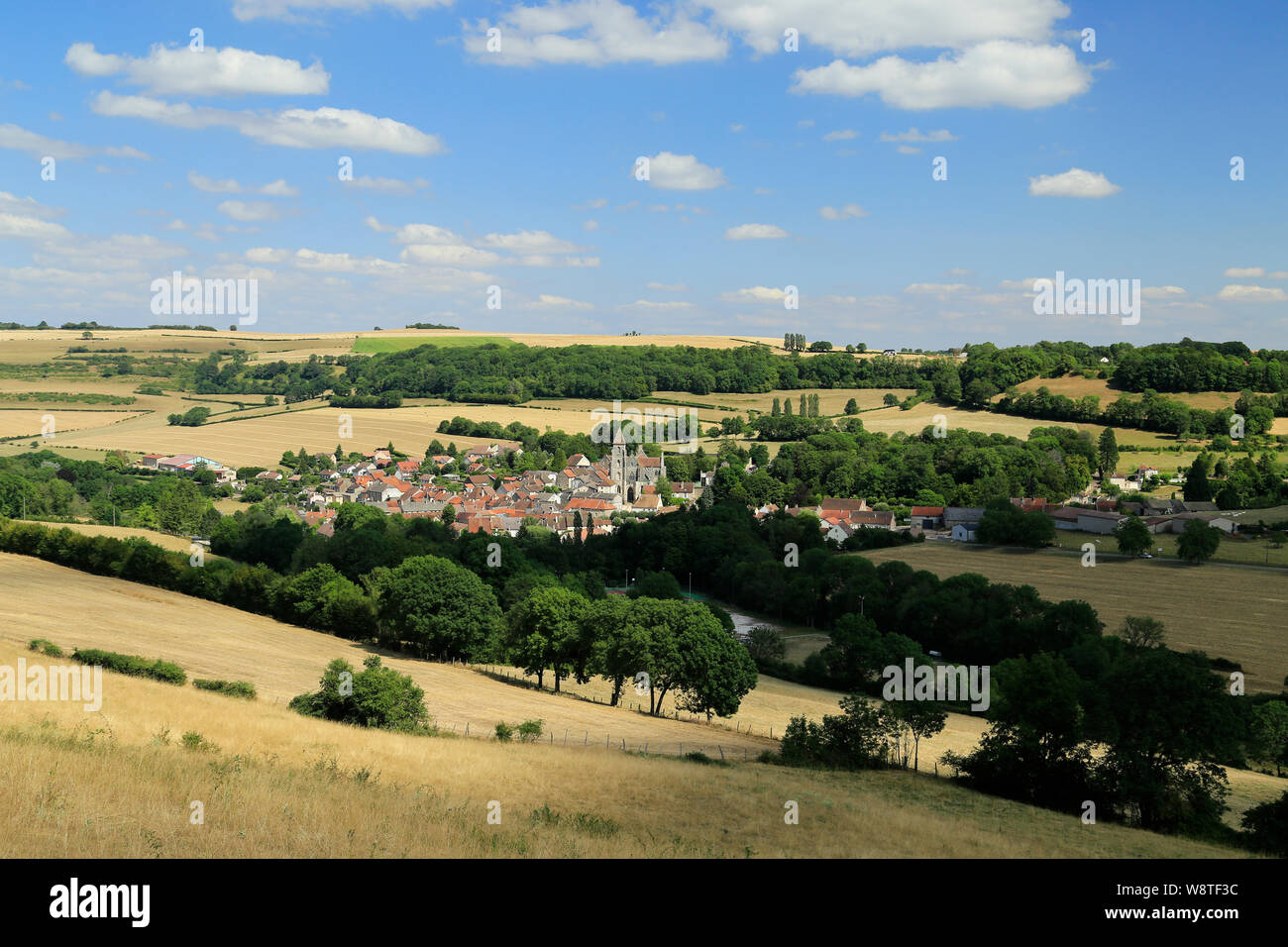 French country village of St. Etienne l'Abbaye surrounded by wheatfields. Stock Photo