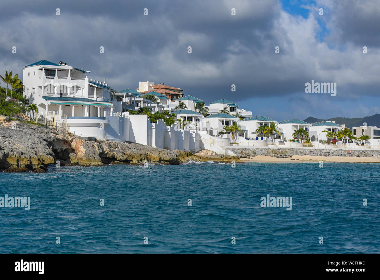 Sint Maarten weather - sunny island of Saint-Martin - luxury homes on a Caribbean beach and tropical houses on St. Maarten - island mansions Stock Photo
