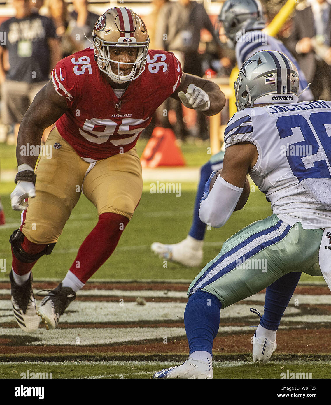 August 10, 2019, Santa Clara, California, : San Francisco 49ers  defensive end Kentavius Street (95) chases down Dallas Cowboys running back  Darius Jackson (26) on Saturday, August 10, 2019, at Levis Stadium