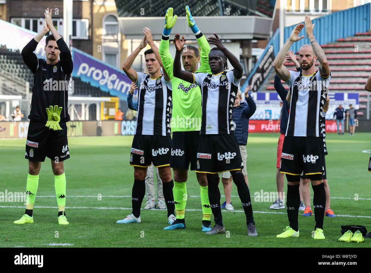 Charleroi, Belgium. 11th Aug, 2019.Players of Sporting Charleroi celebrates  with fans after winning the Jupiler Pro League match day 3 between Sporting  Charleroi and Royal Antwerp Fc on August 11, 2019 in