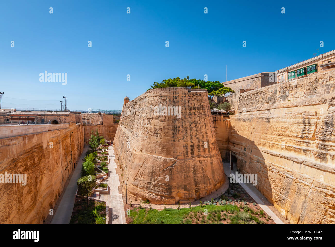 Ancient Fortification Wall at City Gate of Valletta, Malta Stock Photo