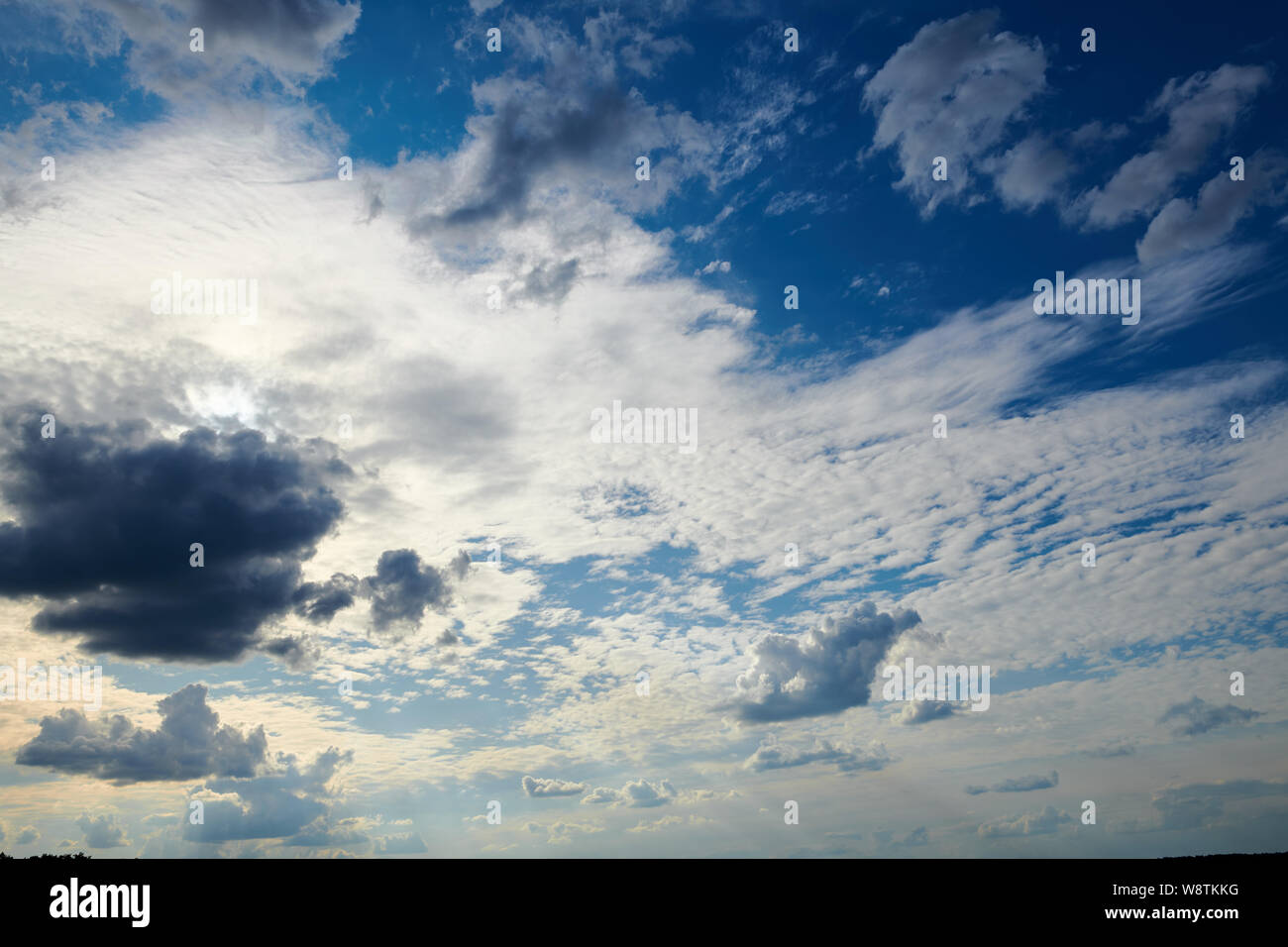 Dark blue sky with clouds for background or texture Stock Photo - Alamy