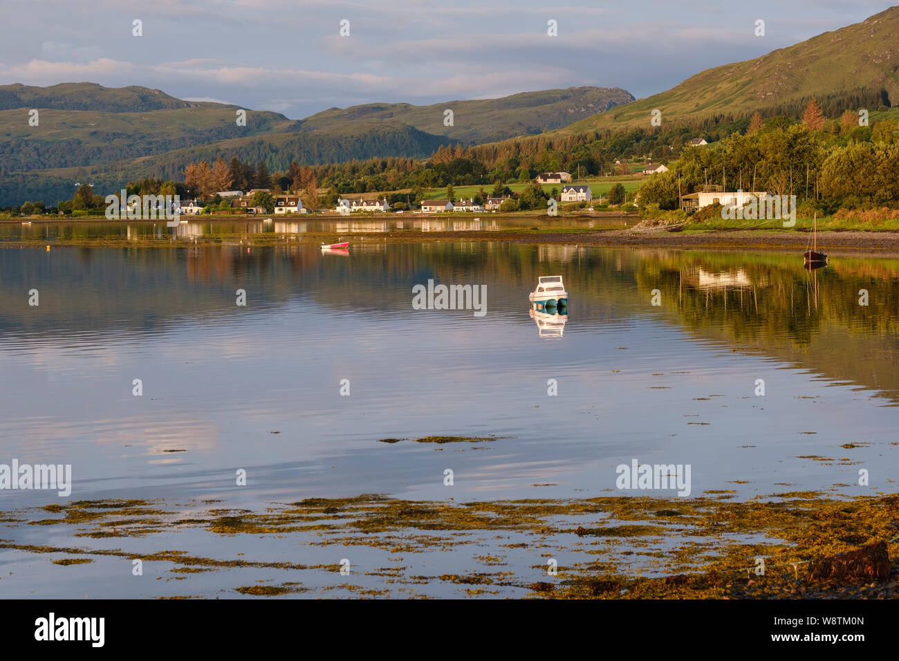Loch Carron, NW Highlands of Scotland with yachts and boats moored. Looking from the A896 road in the village of Lochcarron, on route of NC500 Stock Photo