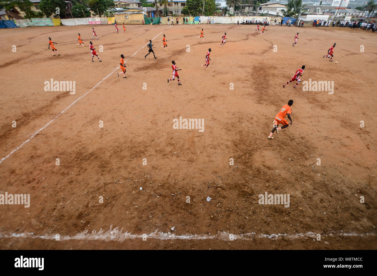 Spectators at a football match, Sea Coach League Cup in Aberdeen, Freetown, Sierra Leone Stock Photo