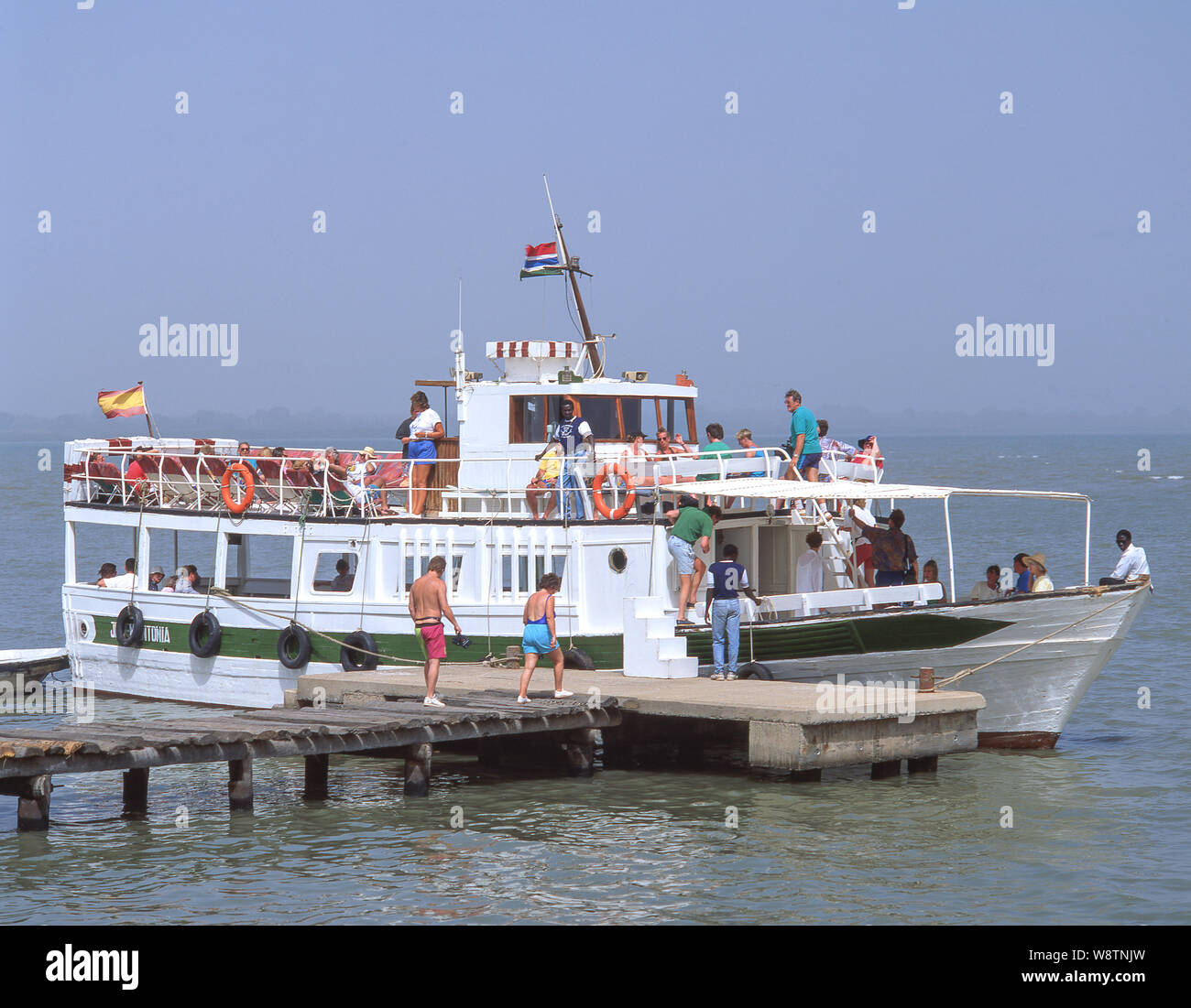 Tourist excursion boat, Kunta Kinteh Island (James Island) trading station, Albreda, North Bank, Republic of The Gambia Stock Photo