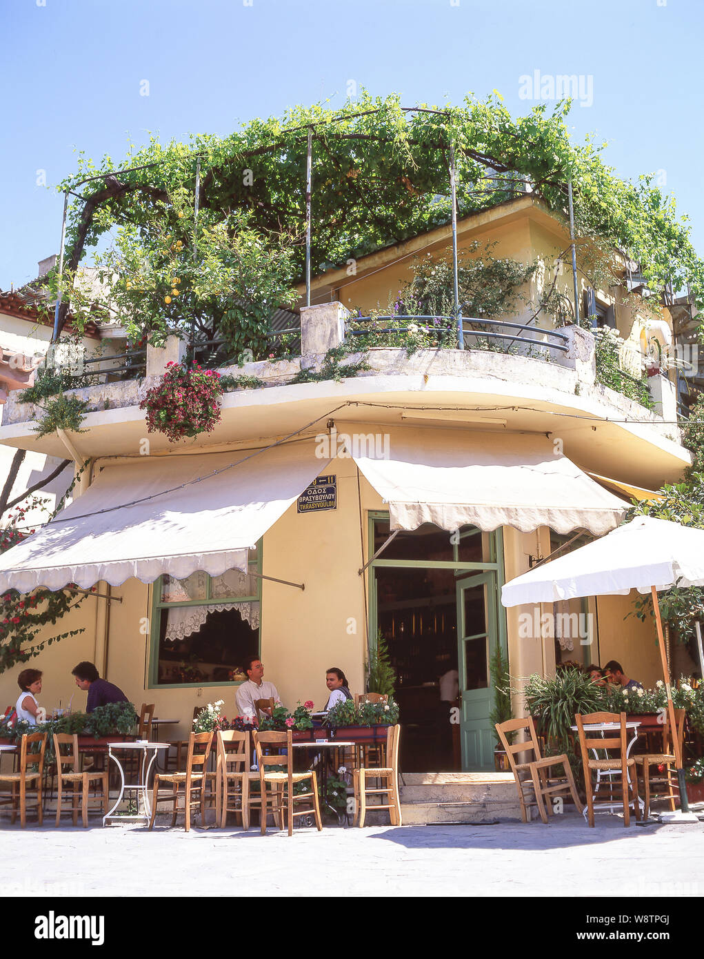 Outdoor Greek taverna, Thrasyvoulou, Plaka, Athens, Central Athens, Greece Stock Photo