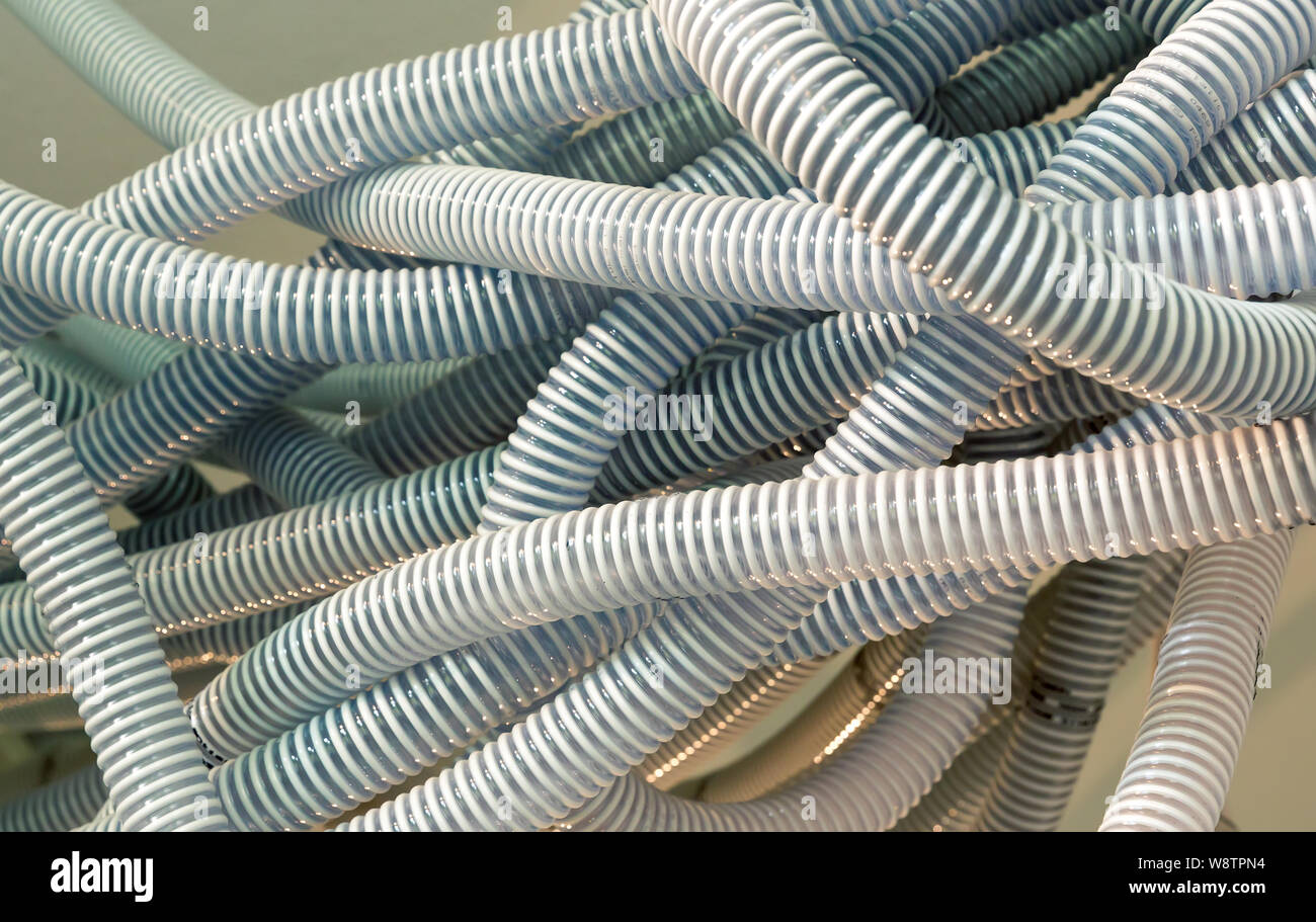 Pile of plastic cable tubes, bunch of wire tubing Stock Photo Alamy