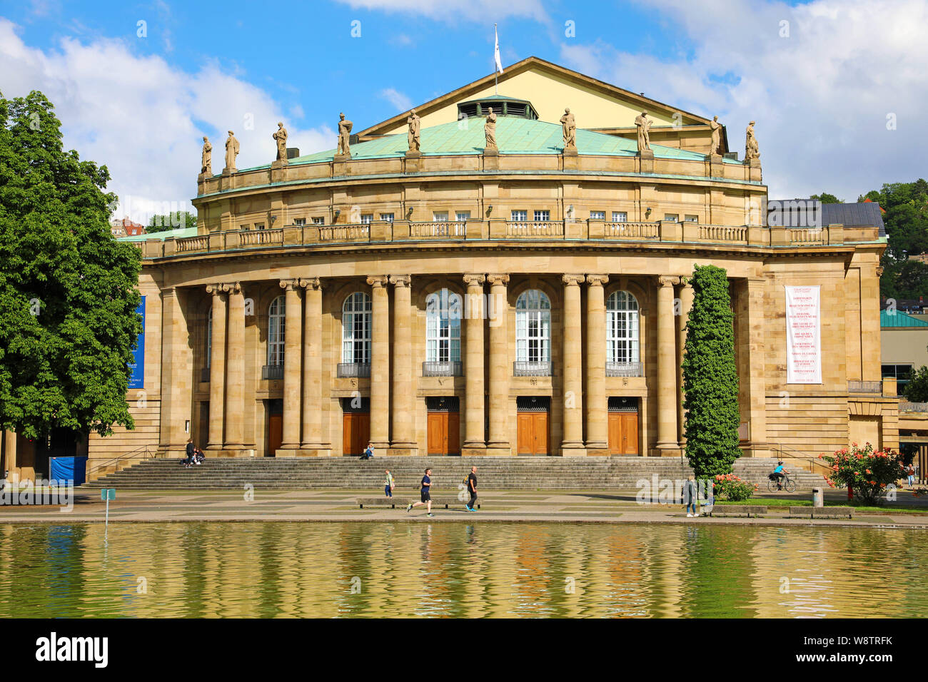 STUTTGART, GERMANY - JUNE 12, 2019: Stuttgart State Theatre Opera building and fountain in Eckensee lake, Germany Stock Photo