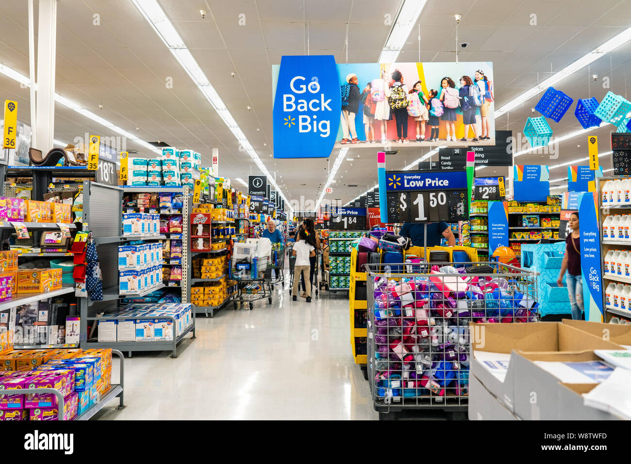 August 8, 2019 Mountain View / CA / USA - Aisle in one of Walmart's stores in south San Francisco bay area; Go Back big banner advertising the back to Stock Photo
