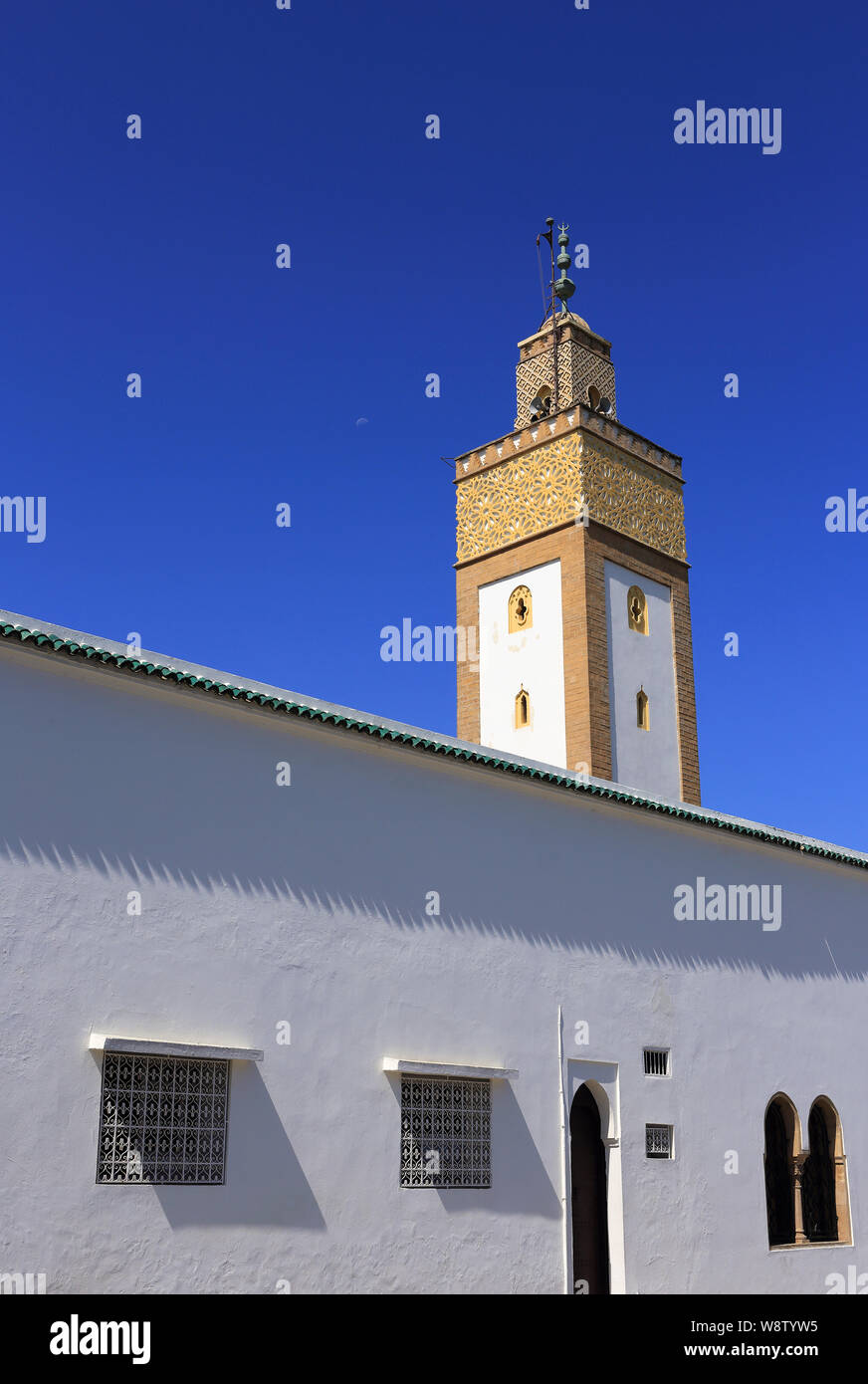 Rabat, Morocco. The 18th Century, Ahl Fas Mosque minarete. Also known as the Royal Palace Mosque. Blue sky, space for text. Stock Photo