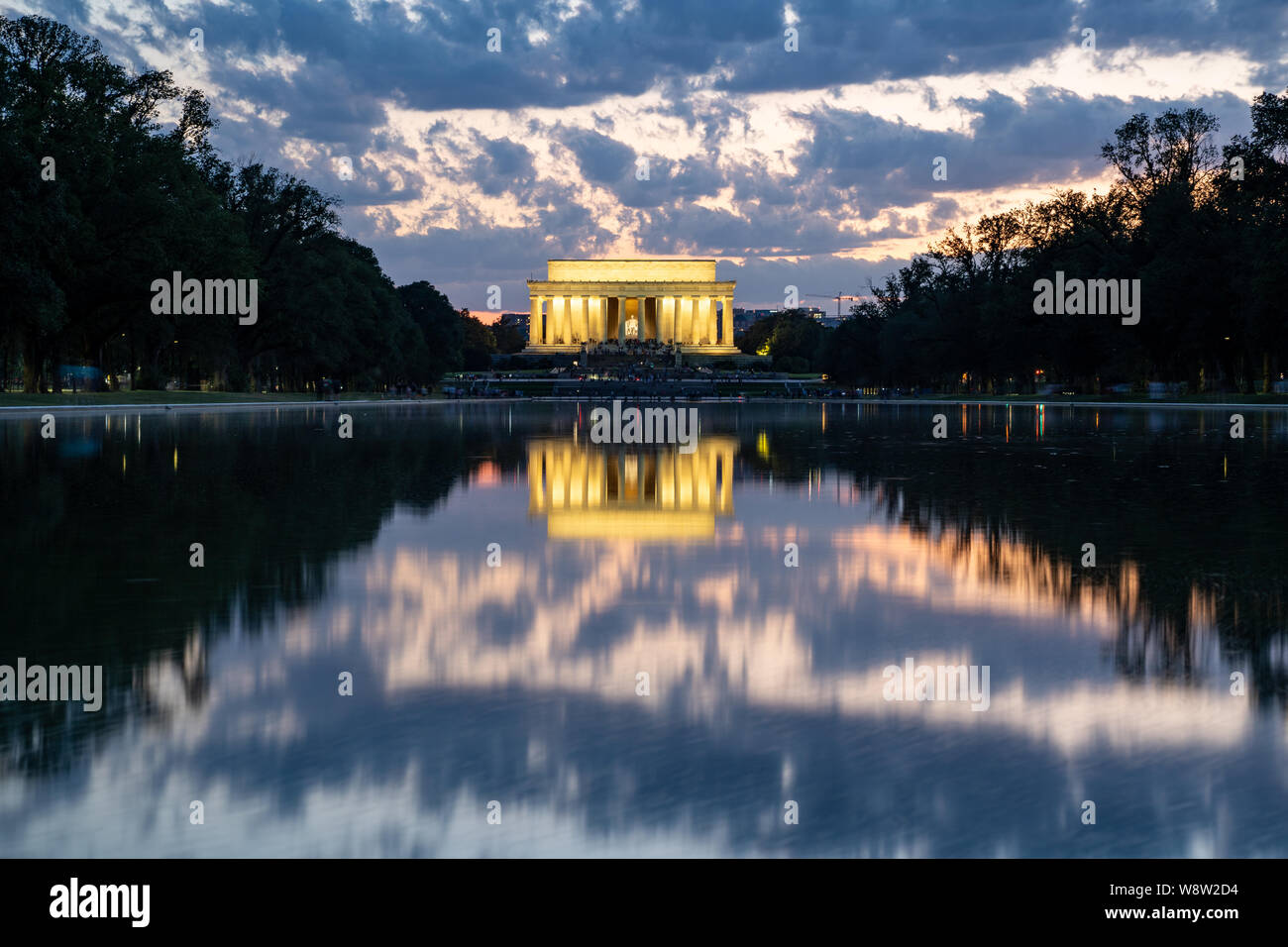 Lincoln memorial reflected in the reflecting pool on the National Mall at dusk sunset. Long exposure Stock Photo