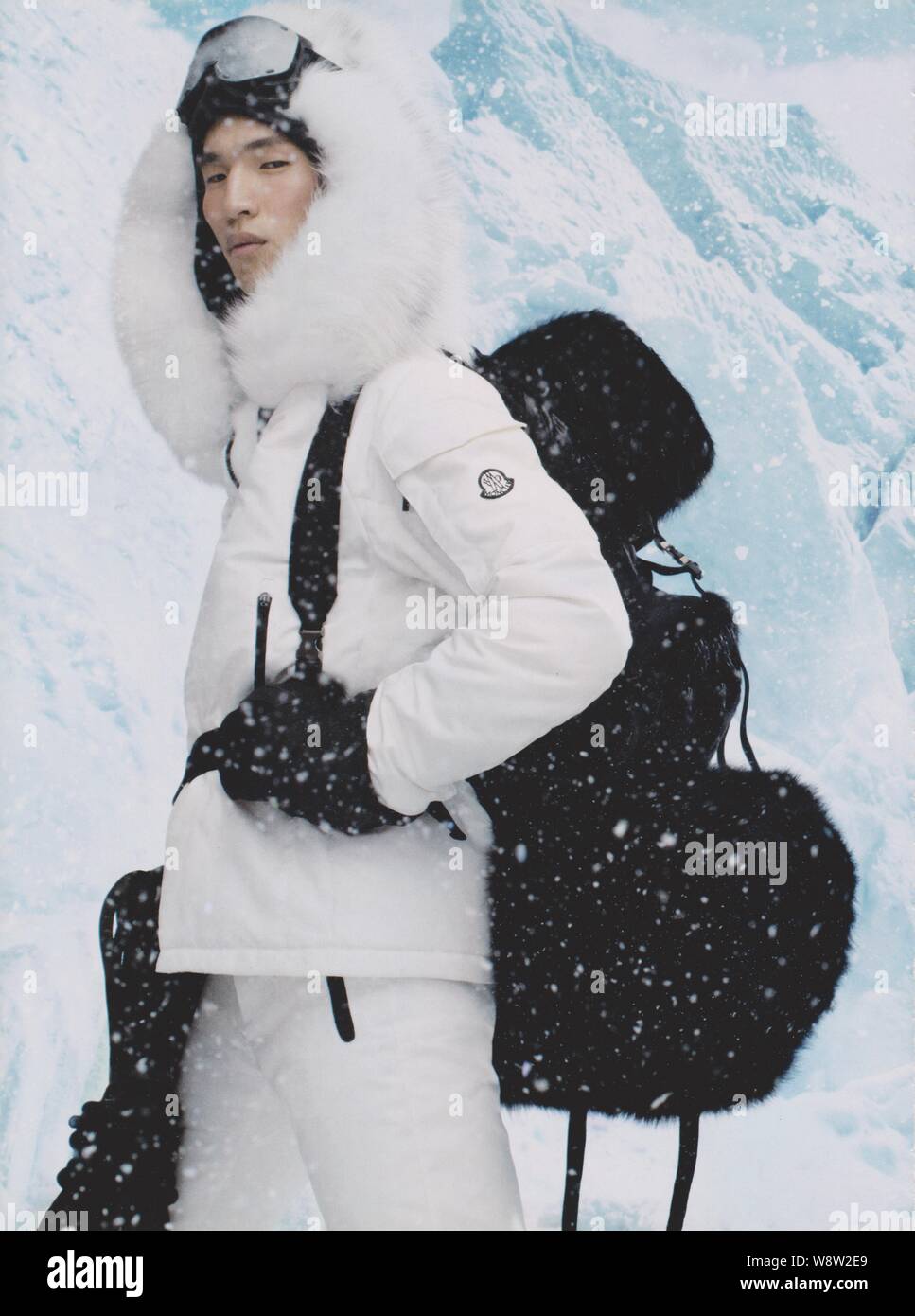 poster advertising Moncler in paper magazine from 2013, advertisement,  creative Moncler advert from 2010s Stock Photo - Alamy