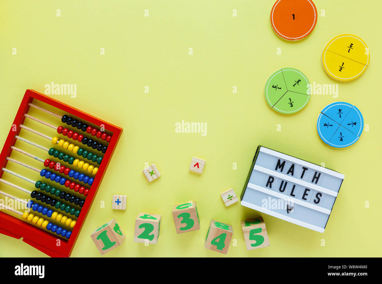 Creative Сolorful blocks, light box, fractions on yellow background.  Interesting funny math for kids. Education, back to school concept.  Geometry and Stock Photo - Alamy