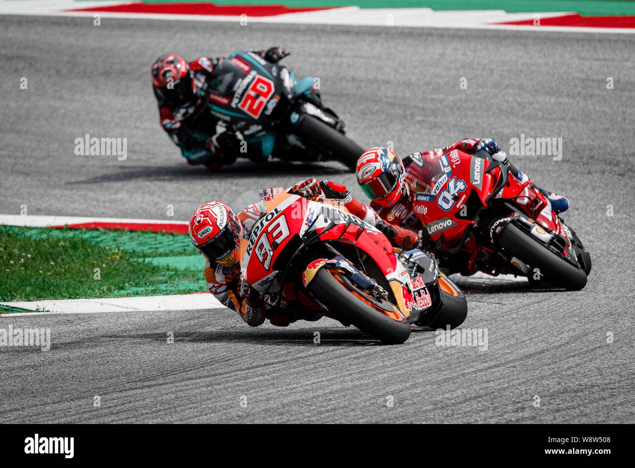 Repsol Honda Team's Spanish rider Marc Marquez (93), Ducati Team's Italian  rider Andrea Dovizioso (4) and Petronas Yamaha SRT's French rider Fabio  Quartararo (20) compete during the Austrian MotoGP Grand Prix race