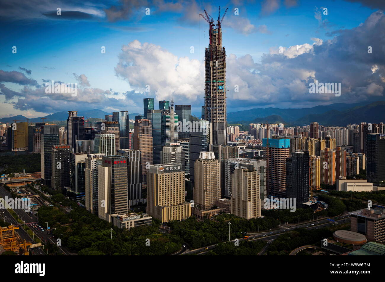 View of the Ping An International Finance Center (IFC) Tower under construction, tallest, and other skyscrapers and high-rise buildings in Shenzhen ci Stock Photo