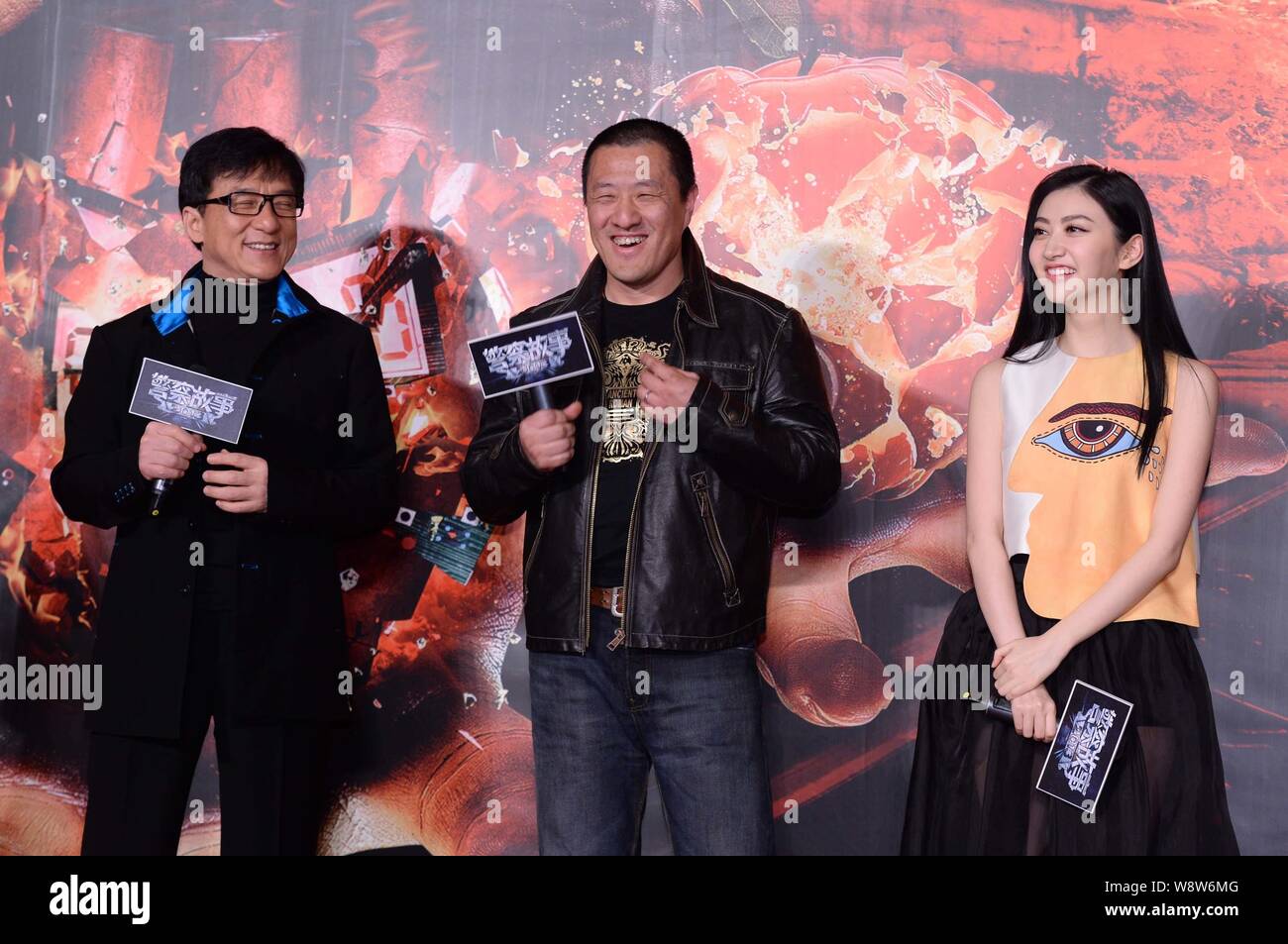 From Left Hong Kong Actor Jackie Chan Chinese Director Ding Sheng And Actress Jing Tian Smile During A Press Conference For Their Movie Police Sto Stock Photo Alamy