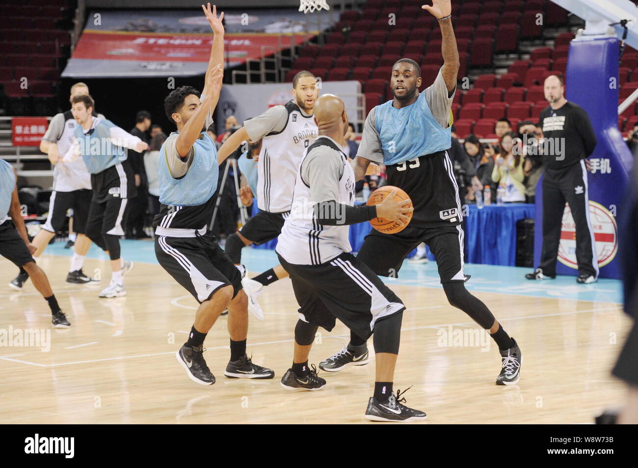 Basketball players of Brooklyn Nets take part in a training session for the Nets' second China game in Beijing, China, 14 October 2014.   Brooklyn Net Stock Photo