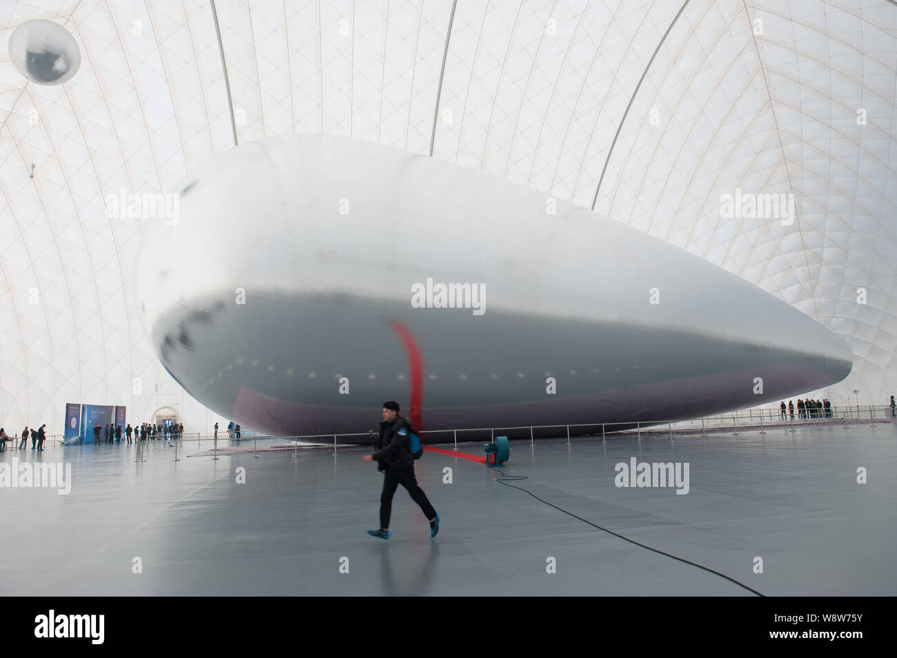 A Visitor Walks Past The Flying Platform Cloud On Display At The Kuang Chi Apollo Base In Shenzhen City South China S Guangdong Province 22 Decemb Stock Photo Alamy