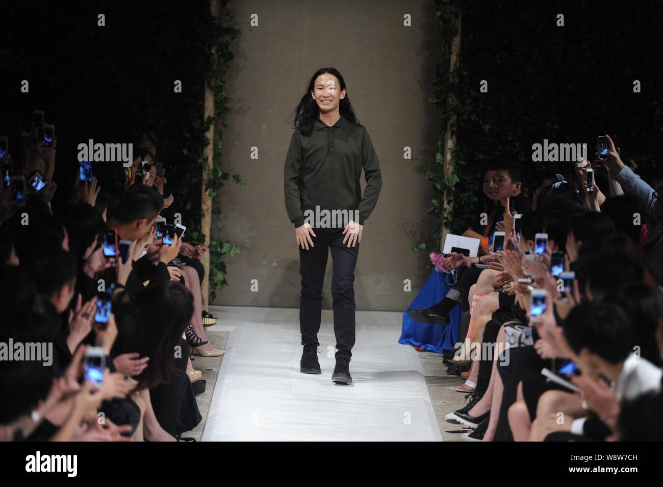 American fashion designer Alexander Wang, Creative Director of Balenciaga,  greets guests during the fashion show for Balenciaga China Edition in Beiji  Stock Photo - Alamy