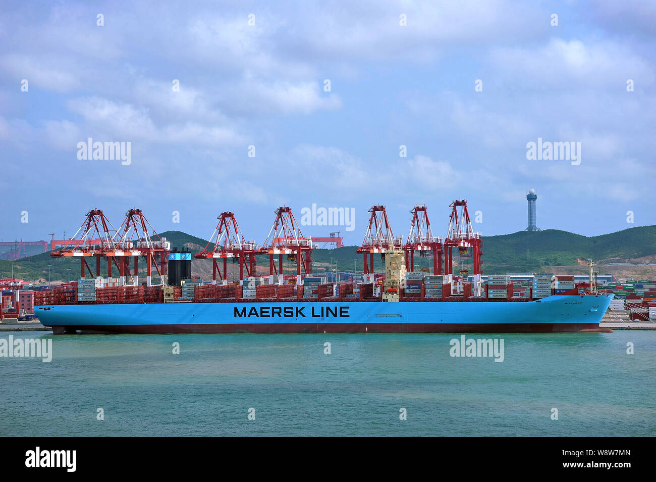 --FILE--The Mary Maersk container ship of Maersk Line docks at the Port of Qingdao in Qingdao city, east Chinas Shandong province, 18 September 2013. Stock Photo