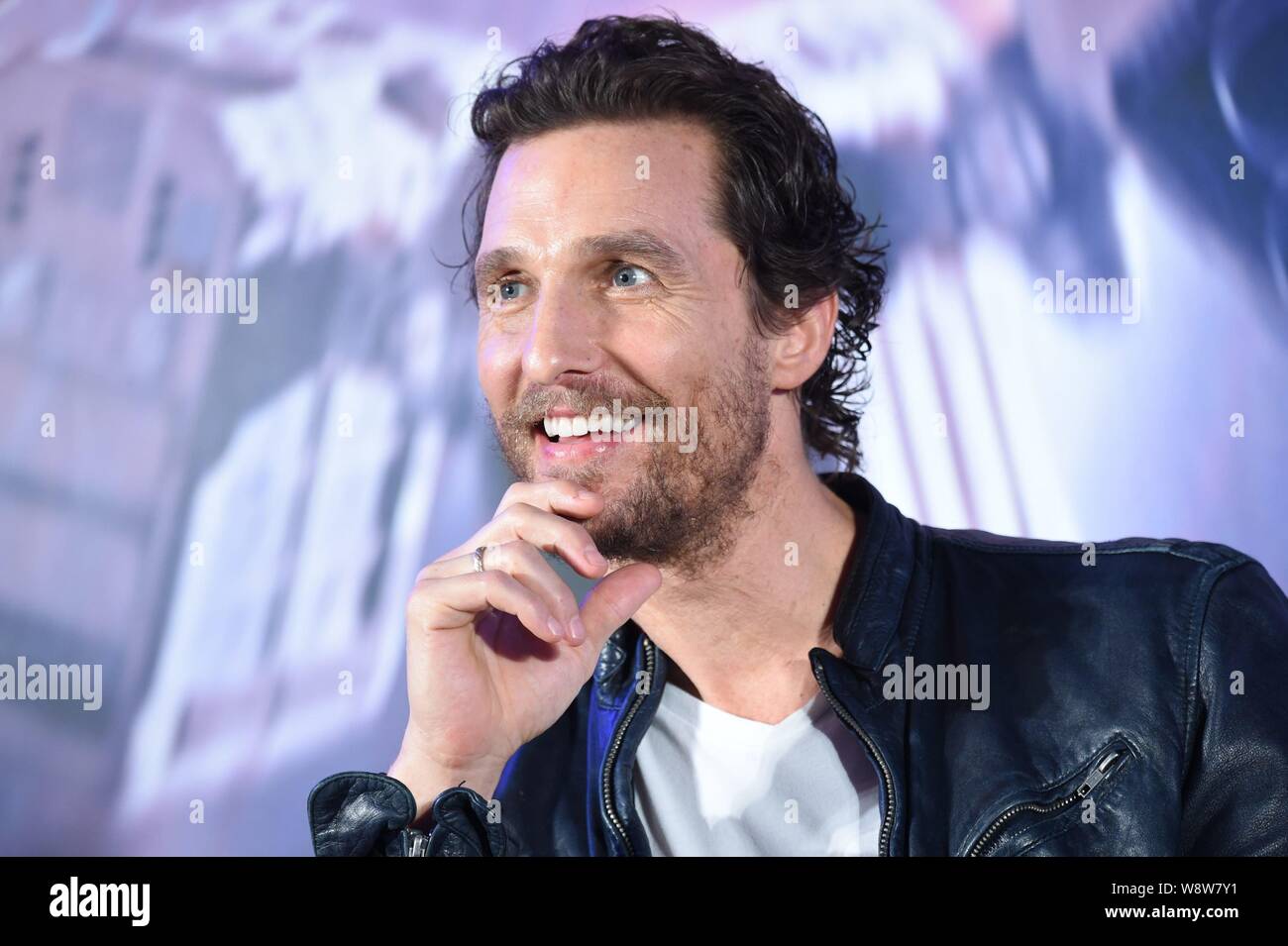 American actor Matthew McConaughey smiles during a press conference for his new movie 'Interstellar' in Shanghai, China, 10 November 2014. Stock Photo