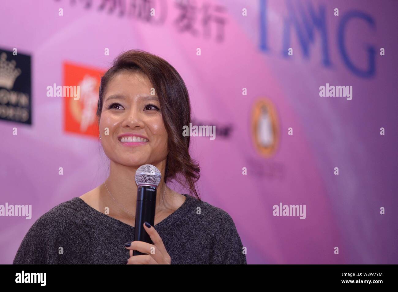 --FILE--Chinese tennis star Li Na smiles during a press conference for her autobiography, My life, in Beijing, China, 22 February 2014.   Chinese tenn Stock Photo