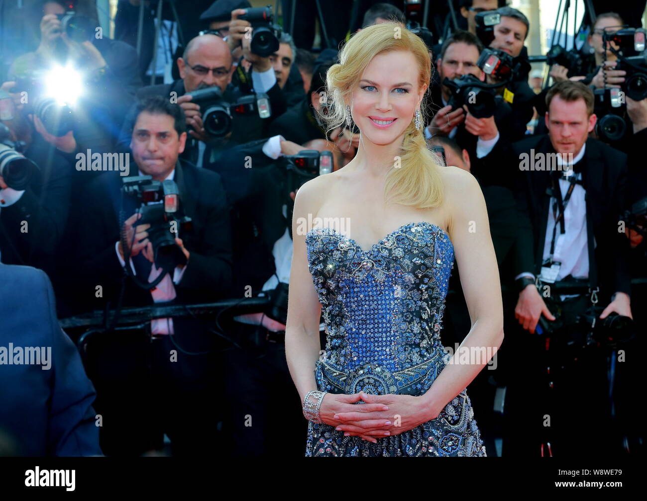 Australian actress Nicole Kidman poses as she arrives at the opening ...