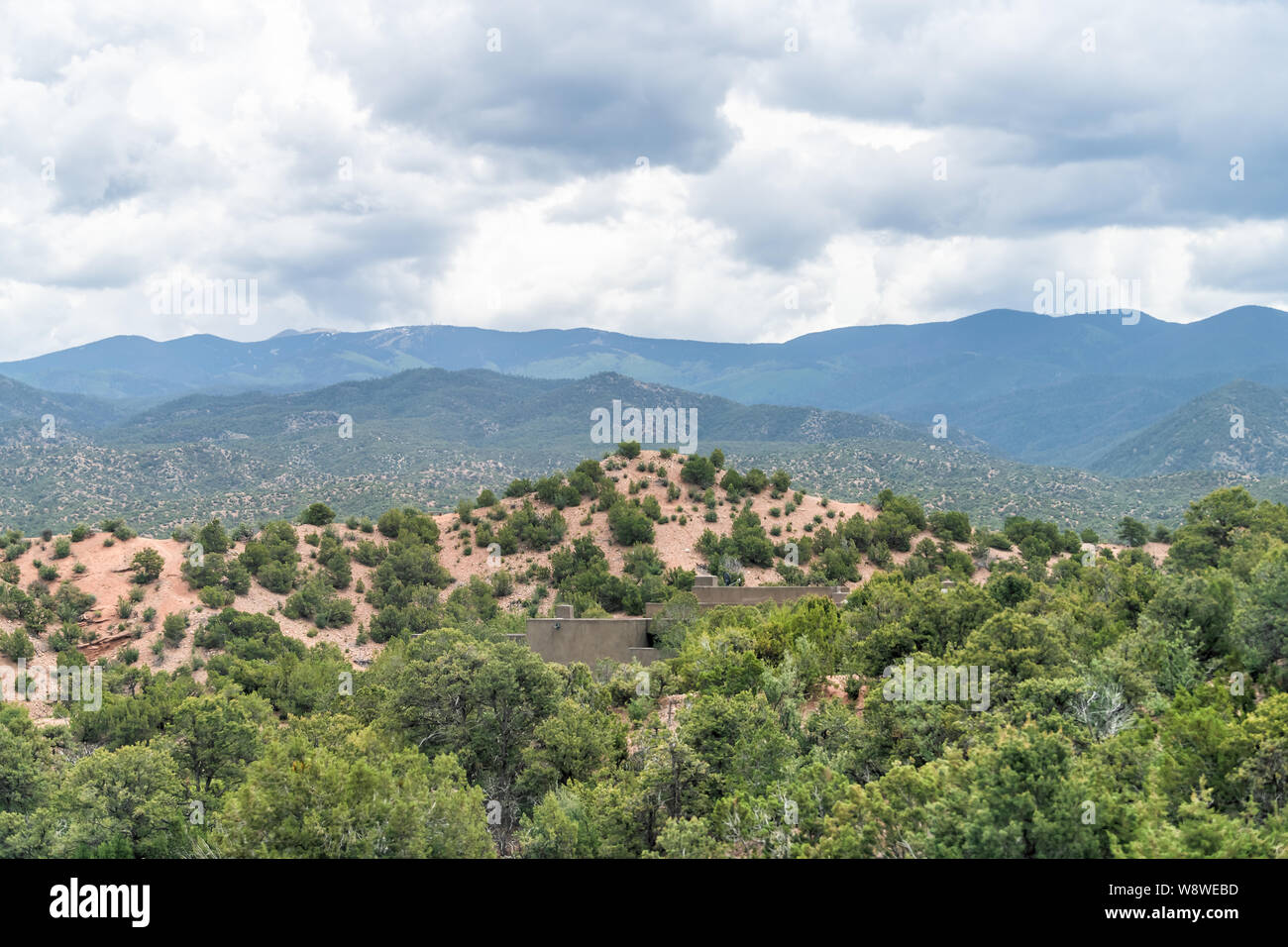 Cloudy evening sunset in Santa Fe, New Mexico mountains in Tesuque