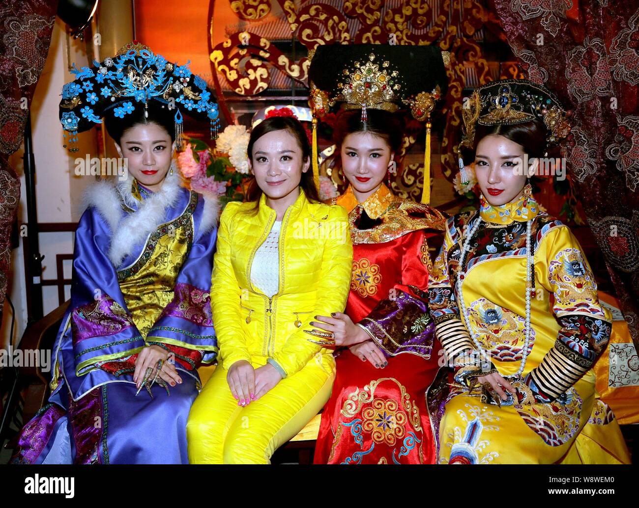 Members Of South Korean Girl Group Swing Girls Dressed In Traditional Chinese Royal Costume Pose