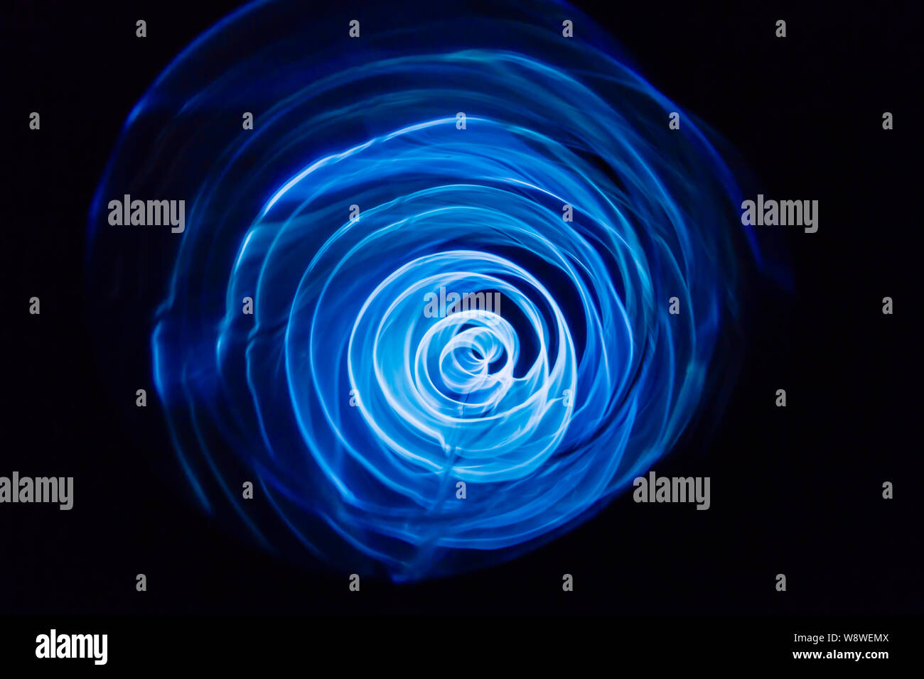 Sound waves in the dark. Blue color Stock Photo