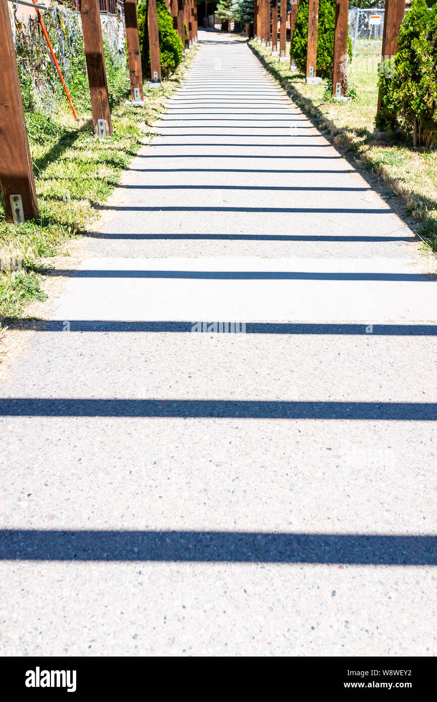 Church tunnel corridor shadows path way with nobody abstract view in El Santuario de Chimayo historic site Stock Photo