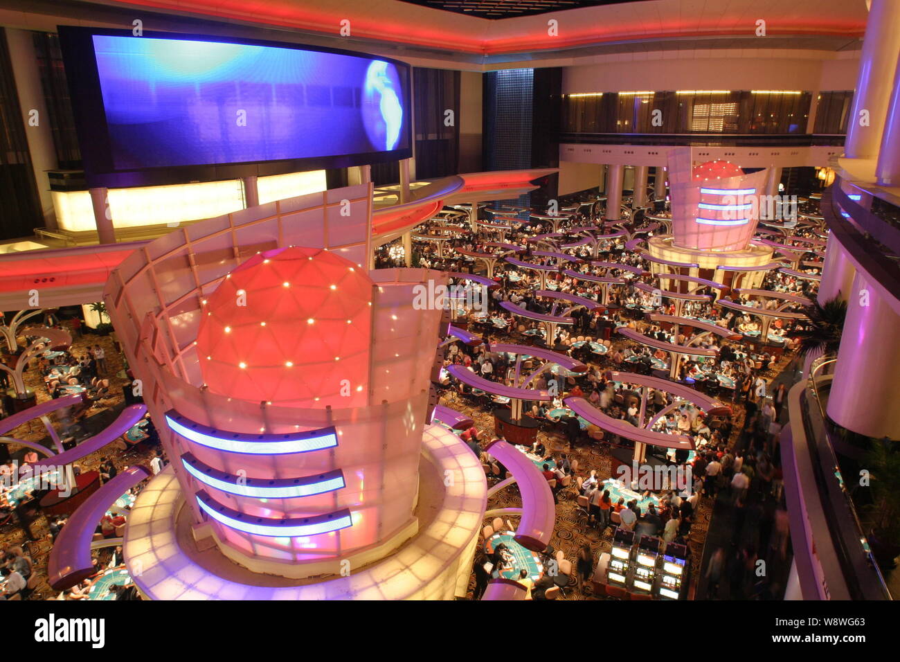 FILE--Night view of the Sands Macao Casino, owned by the Las Vegas Sands  Corporation, in Macao, China, 28 March 2015. It's been a while since inve  Stock Photo - Alamy