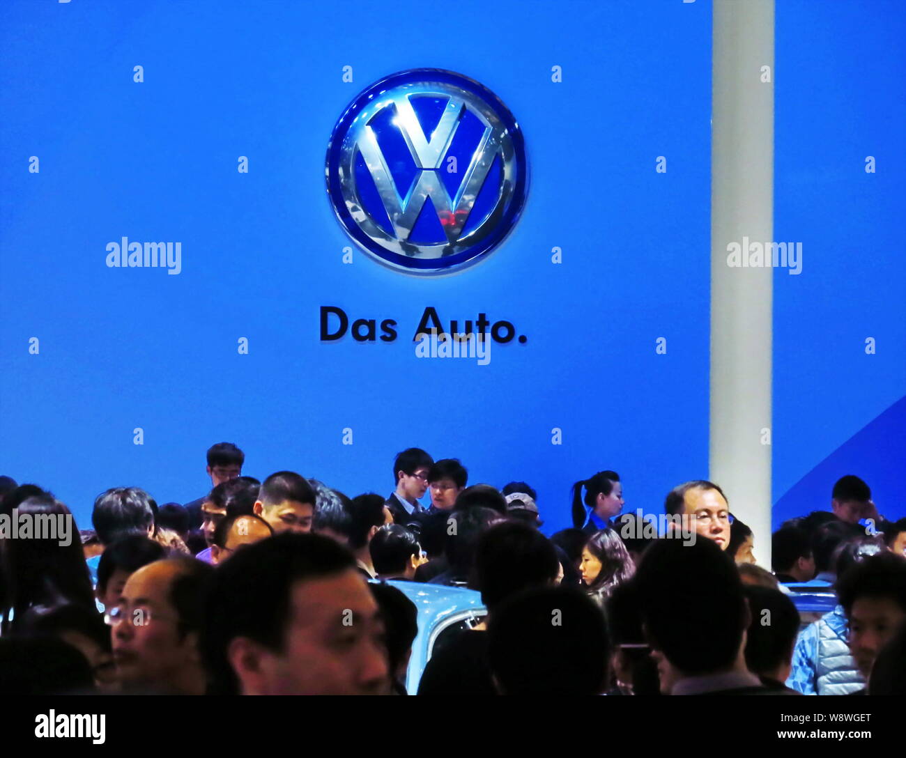 --FILE--Visitors crowd the stand of Shanghai Volkswagen during the 15th Shanghai International Automobile Industry Exhibition, known as Auto Shanghai Stock Photo